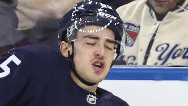 Mar 5, 2025; New York, New York, USA; New York Rangers left wing Brett Berard (65) gets up off the ice following a collision in the first period against the Washington Capitals at Madison Square Garden. Mar 5, 2025; New York, New York, USA; New York Rangers left wing Brett Berard (65) gets up off the ice following a collision in the first period against the Washington Capitals at Madison Square Garden.