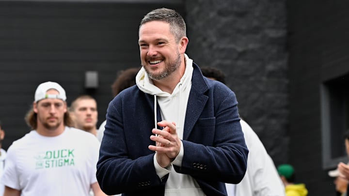 Oct 11, 2025; Eugene, Oregon, USA; Oregon Ducks head coach Dan Lanning arrives with players before the game between the Indiana Hoosiers and the Oregon Ducks at Autzen Stadium. Mandatory Credit: Troy Wayrynen-Imagn Images
