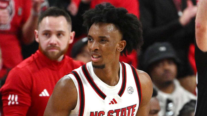 Feb 17, 2026; Raleigh, North Carolina, USA;  NC State Wolfpack guard Paul McNeil Jr. (2) reacts after scoring a basket against the North Carolina Tar Heels during the second half at Lenovo Center. Mandatory Credit: Zachary Taft-Imagn Images