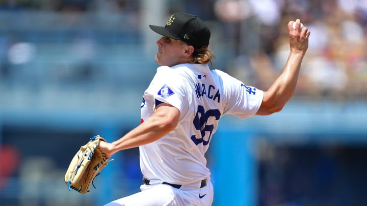 May 19, 2024; Los Angeles, California, USA; Los Angeles Dodgers pitcher Landon Knack (96) throws against the Cincinnati Reds during the third inning at Dodger Stadium. Mandatory Credit: Gary A. Vasquez-USA TODAY Sports