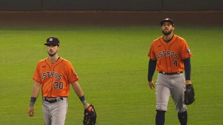 Sep 9, 2020; Oakland, California, USA; Houston Astros left fielder Kyle Tucker (30) and Houston Astros center fielder George Springer (4) leave the field after a loss against the Oakland Athletics at Oakland Coliseum. Mandatory Credit: Kelley L Cox-Imagn Images