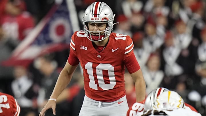 Sep 7, 2024; Columbus, Ohio, USA;  Ohio State Buckeyes quarterback Julian Sayin (10) takes a snap against the Western Michigan Broncos during the second half at Ohio Stadium.  Mandatory Credit: Adam Cairns-Imagn Images