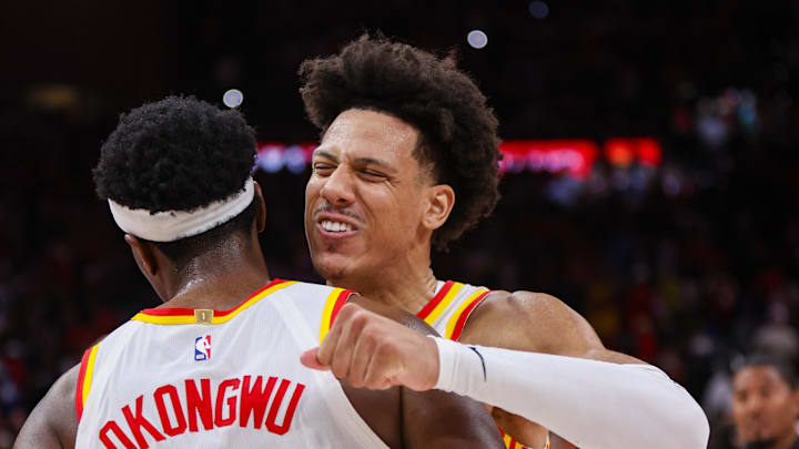 Jalen Johnson (1) celebrates with forward Onyeka Okongwu (17) after a victory over the New York Knicks in game three of the first round of the 2026 NBA Playoffs at State Farm Arena