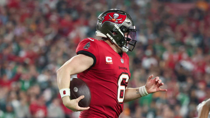 Jan 15, 2024; Tampa, Florida, USA; Tampa Bay Buccaneers quarterback Baker Mayfield (6) runs with the ball against the Philadelphia Eagles during the first half of a 2024 NFC wild card game at Raymond James Stadium. Mandatory Credit: Kim Klement Neitzel-USA TODAY Sports Jan 15, 2024; Tampa, Florida, USA; Tampa Bay Buccaneers quarterback Baker Mayfield (6) runs with the ball against the Philadelphia Eagles during the first half of a 2024 NFC wild card game at Raymond James Stadium. Mandatory Credit: Kim Klement Neitzel-USA TODAY Sports