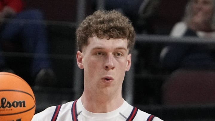 March 9, 2026; Las Vegas, NV, USA; Saint Mary's Gaels center Andrew McKeever (45) passes the basketball against Santa Clara Broncos center Bukky Oboye (12) during the first half at Orleans Arena. Mandatory Credit: Kyle Terada-Imagn Images