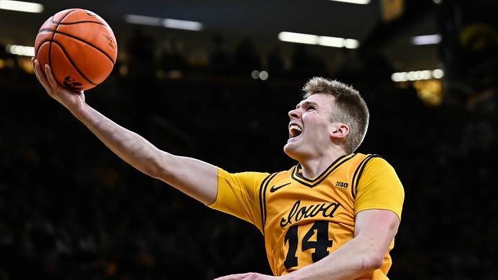 Feb 25, 2026; Iowa City, Iowa, USA; Iowa Hawkeyes guard Bennett Stirtz (14) goes to the basket against the Ohio State Buckeyes during the second half at Carver-Hawkeye Arena. Mandatory Credit: Jeffrey Becker-Imagn Images Feb 25, 2026; Iowa City, Iowa, USA; Iowa Hawkeyes guard Bennett Stirtz (14) goes to the basket against the Ohio State Buckeyes during the second half at Carver-Hawkeye Arena. Mandatory Credit: Jeffrey Becker-Imagn Images