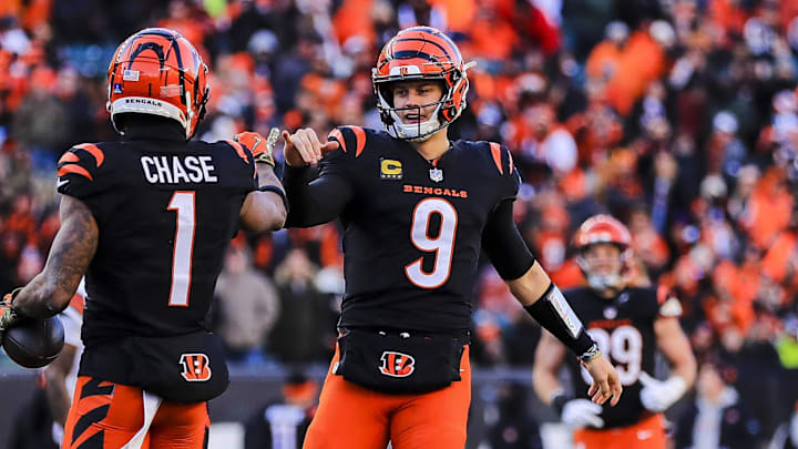 Dec 22, 2024; Cincinnati, Ohio, USA; Cincinnati Bengals wide receiver Ja'Marr Chase (1) reacts with quarterback Joe Burrow (9) after scoring a touchdown in the second half against the Cleveland Browns at Paycor Stadium. Mandatory Credit: Katie Stratman-Imagn Images Dec 22, 2024; Cincinnati, Ohio, USA; Cincinnati Bengals wide receiver Ja'Marr Chase (1) reacts with quarterback Joe Burrow (9) after scoring a touchdown in the second half against the Cleveland Browns at Paycor Stadium. Mandatory Credit: Katie Stratman-Imagn Images