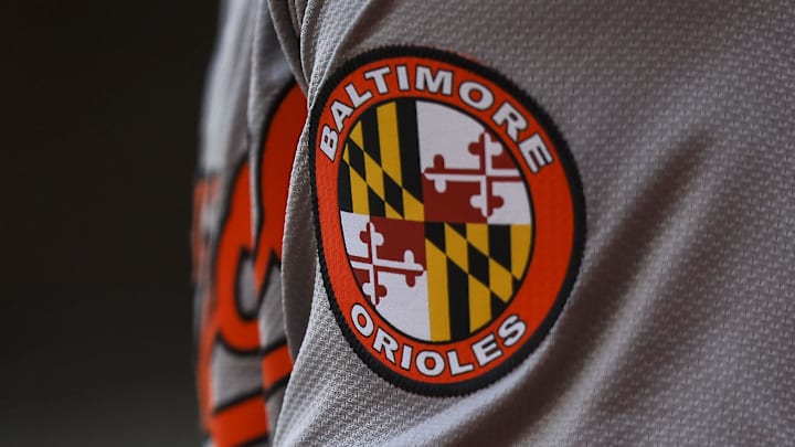 The Baltimore Orioles logo on the sleeve of designated hitter Gunnar Henderson (2).