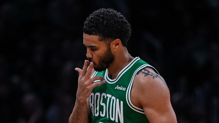 Mar 18, 2026; Boston, Massachusetts, USA; Boston Celtics forward Jayson Tatum (0) reacts after his three point basket against the Golden State Warriors in the second half at TD Garden. Mandatory Credit: David Butler II-Imagn Images