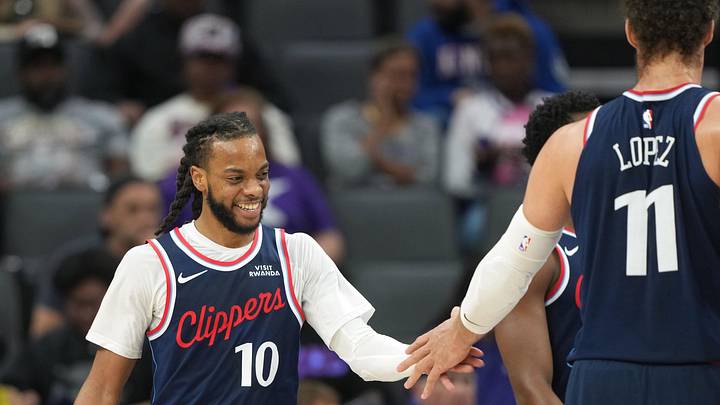 LA Clippers guard Darius Garland is congratulated by center Brook Lopez. LA Clippers guard Darius Garland is congratulated by center Brook Lopez.