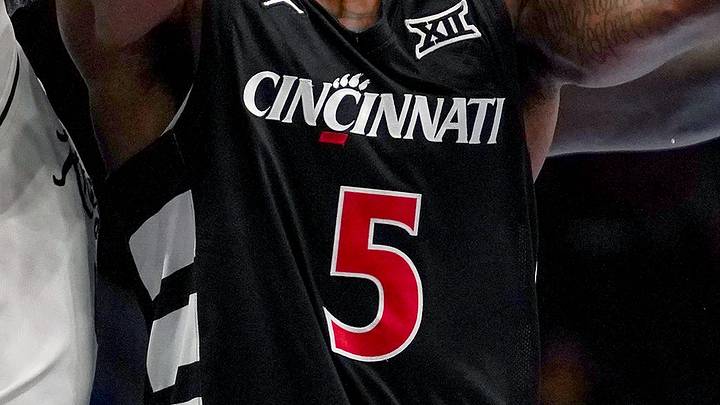 Cincinnati Bearcats guard Sencire Harris (5) is double teamed by UCF Knights players in the first half of the second round of the Phillips 66 Big 12 Men’s Basketball Tournament between the Cincinnati Bearcats and UCF Knights, Wednesday, March 11, 2026, at T-Mobile Center in Kansas City, MO. Cincinnati Bearcats guard Sencire Harris (5) is double teamed by UCF Knights players in the first half of the second round of the Phillips 66 Big 12 Men’s Basketball Tournament between the Cincinnati Bearcats and UCF Knights, Wednesday, March 11, 2026, at T-Mobile Center in Kansas City, MO.