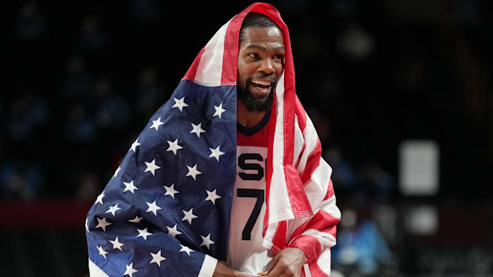Aug 7, 2021; Saitama, Japan; USA player Kevin Durant (7) reacts after winning the gold medal game during the Tokyo 2020 Olympic Summer Games at Saitama Super Arena. Mandatory Credit: Kyle Terada-Imagn Images Aug 7, 2021; Saitama, Japan; USA player Kevin Durant (7) reacts after winning the gold medal game during the Tokyo 2020 Olympic Summer Games at Saitama Super Arena. Mandatory Credit: Kyle Terada-Imagn Images