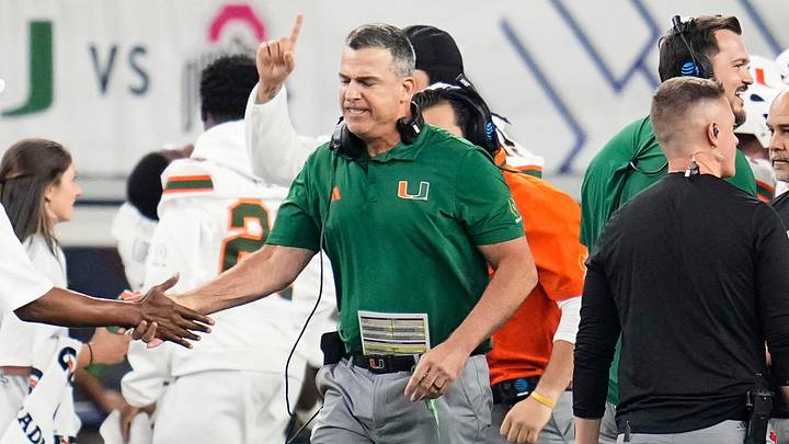 Miami Hurricanes head coach Mario Cristobal celebrates during the Cotton Bowl at AT&T Stadium in Arlington, Texas for the College Football Playoff quarterfinal game against the Ohio State Buckeyes on Dec. 31, 2025. Ohio State lost 24-14.