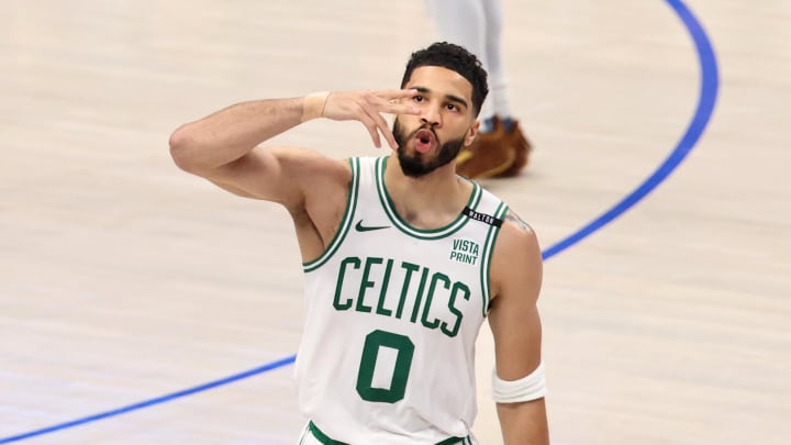 Jun 12, 2024; Dallas, Texas, USA; Boston Celtics forward Jayson Tatum (0) reacts after a play against the Dallas Mavericks during the third quarter during game three of the 2024 NBA Finals at American Airlines Center. Jun 12, 2024; Dallas, Texas, USA; Boston Celtics forward Jayson Tatum (0) reacts after a play against the Dallas Mavericks during the third quarter during game three of the 2024 NBA Finals at American Airlines Center.