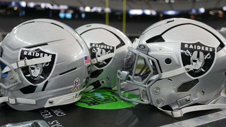 Nov 23, 2025; Paradise, Nevada, USA; Las Vegas Raiders helmets on the sidelines at Allegiant Stadium. Mandatory Credit: Kirby Lee-Imagn Images