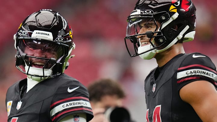Arizona Cardinals quarterback Kyler Murray (1) chats with teammate Michael Wilson (14) before their game against the Tennessee Titans at State Farm Stadium in Glendale on Oct. 5, 2025.