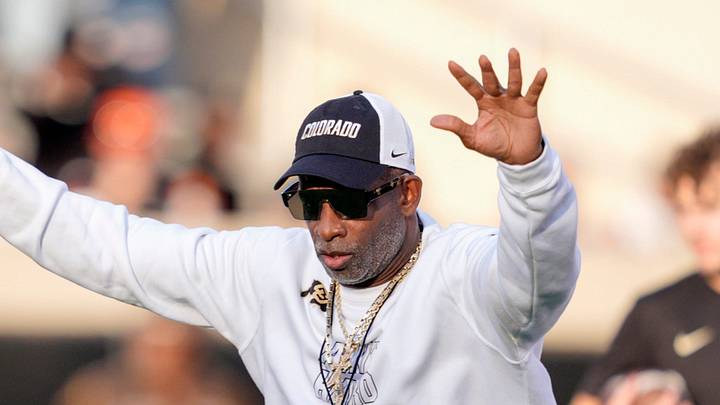 Colorado coach Deion Sanders stands on the field  as the team warms up before a college football game between the Oklahoma State Cowboys (OSU) and the Colorado Buffaloes at Boone Pickens Stadium in Stillwater, Okla., Saturday, Oct. 24, 2026.