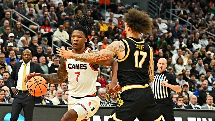 Mar 20, 2026; St. Louis, MO, USA; Miami (FL) Hurricanes forward Shelton Henderson (7) drives to the basket as Missouri Tigers guard Jayden Stone (17) defends during the second half during a first round game of the men's 2026 NCAA Tournament at Enterprise Center. Mandatory Credit: Jeff Le-Imagn Images Mar 20, 2026; St. Louis, MO, USA; Miami (FL) Hurricanes forward Shelton Henderson (7) drives to the basket as Missouri Tigers guard Jayden Stone (17) defends during the second half during a first round game of the men's 2026 NCAA Tournament at Enterprise Center. Mandatory Credit: Jeff Le-Imagn Images