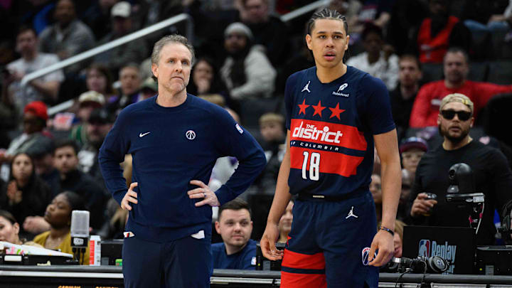 Mar 5, 2025; Washington, District of Columbia, USA; Washington Wizards head coach Brian Keefe looks on with forward Kyshawn George (18) during the fourth quarter against the Utah Jazz at Capital One Arena. Mandatory Credit: Reggie Hildred-Imagn Images Mar 5, 2025; Washington, District of Columbia, USA; Washington Wizards head coach Brian Keefe looks on with forward Kyshawn George (18) during the fourth quarter against the Utah Jazz at Capital One Arena. Mandatory Credit: Reggie Hildred-Imagn Images