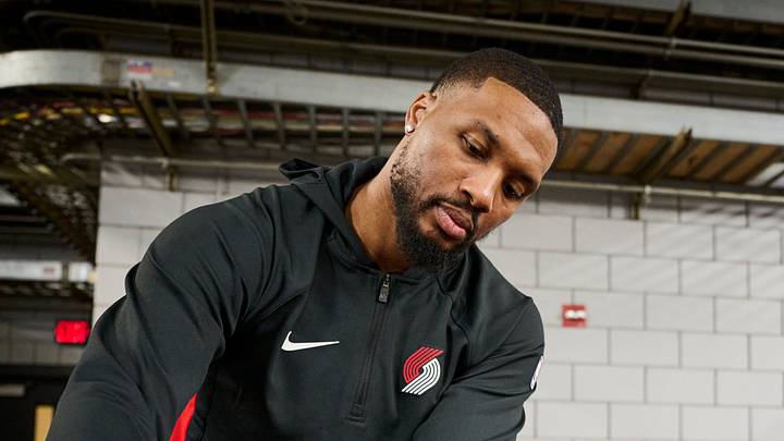 Portland Trail Blazers guard Damian Lillard signs basketballs during media day at the Moda Center. Portland Trail Blazers guard Damian Lillard signs basketballs during media day at the Moda Center.