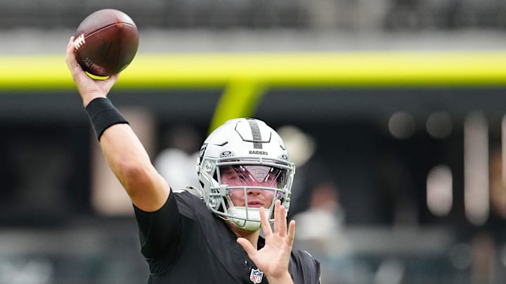 Aug 16, 2025; Paradise, Nevada, USA; Las Vegas Raiders quarterback Cam Miller (5) warms up before a preseason game against the San Francisco 49ers at Allegiant Stadium. Mandatory Credit: Stephen R. Sylvanie-Imagn Images