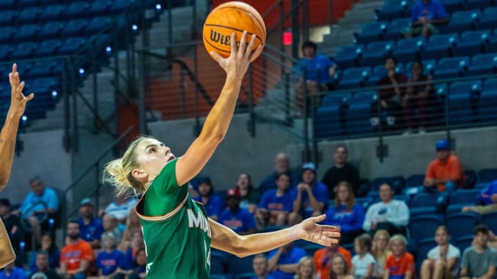 Haley Cavinder (24) scoring against Florida In Victory Haley Cavinder (24) scoring against Florida In Victory