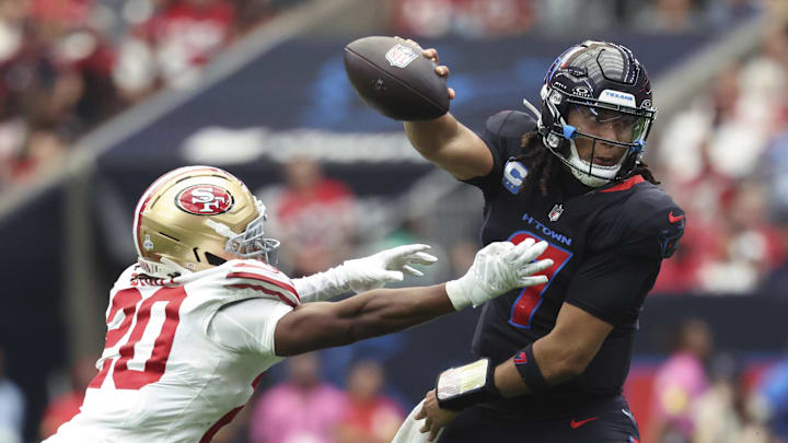 Oct 26, 2025; Houston, Texas, USA; San Francisco 49ers cornerback Upton Stout (20) attempts to sack Houston Texans quarterback C.J. Stroud (7) during the fourth quarter at NRG Stadium. Mandatory Credit: Troy Taormina-Imagn Images Oct 26, 2025; Houston, Texas, USA; San Francisco 49ers cornerback Upton Stout (20) attempts to sack Houston Texans quarterback C.J. Stroud (7) during the fourth quarter at NRG Stadium. Mandatory Credit: Troy Taormina-Imagn Images