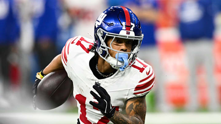 Nov 23, 2025; Detroit, Michigan, USA; New York Giants wide receiver Wan'Dale Robinson (17) runs upfield after catching a swing pass in the second quarter against the Detroit Lions at Ford Field. Mandatory Credit: Lon Horwedel-Imagn Images
