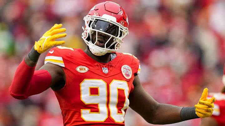 Dec 25, 2023; Kansas City, Missouri, USA; Kansas City Chiefs defensive end Charles Omenihu (90) rallies the crowd during the second half against the Las Vegas Raiders at GEHA Field at Arrowhead Stadium. Mandatory Credit: Jay Biggerstaff-Imagn Images