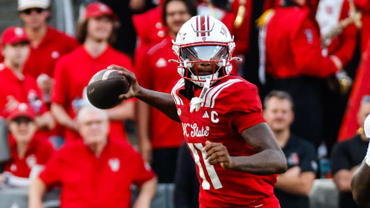 Aug 28, 2025; Raleigh, North Carolina, USA; North Carolina State Wolfpack quarterback CJ Bailey (11) prepares to throw the ball during the first half of the game against East Carolina Pirates at Carter-Finley Stadium. Mandatory Credit: Jaylynn Nash-Imagn Images Aug 28, 2025; Raleigh, North Carolina, USA; North Carolina State Wolfpack quarterback CJ Bailey (11) prepares to throw the ball during the first half of the game against East Carolina Pirates at Carter-Finley Stadium. Mandatory Credit: Jaylynn Nash-Imagn Images