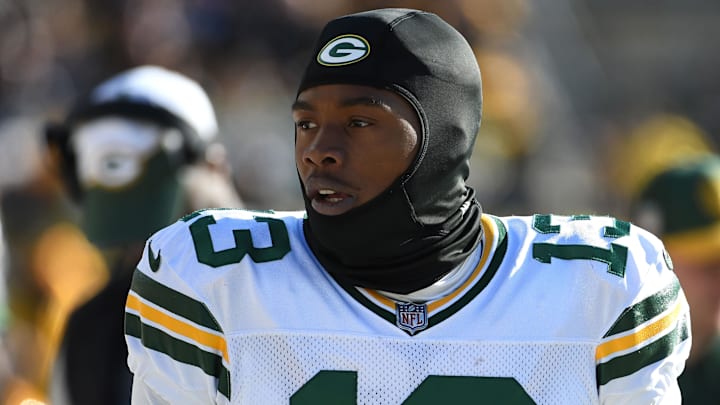 Nov 12, 2023; Pittsburgh, Pennsylvania, USA;  Green Bay Packers wide receiver Dontayvion Wicks (13) on the sidelines during a game against the Pittsburgh Steelers at Acrisure Stadium.