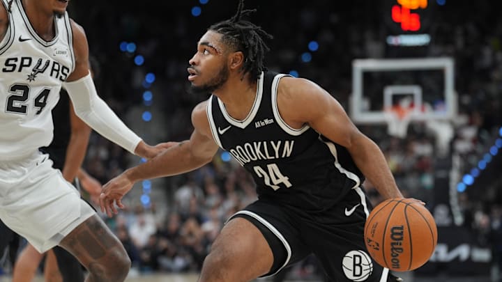 Oct 26, 2025; San Antonio, Texas, USA; Brooklyn Nets guard Cam Thomas (24) dribbles against San Antonio Spurs guard Devin Vassell (24) in the second half at Frost Bank Center. Mandatory Credit: Daniel Dunn-Imagn Images Oct 26, 2025; San Antonio, Texas, USA; Brooklyn Nets guard Cam Thomas (24) dribbles against San Antonio Spurs guard Devin Vassell (24) in the second half at Frost Bank Center. Mandatory Credit: Daniel Dunn-Imagn Images