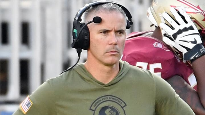 Nov 2, 2024; Tallahassee, Florida, USA; Florida State Seminoles head coach Mike Norvell looks on from the sideline after the North Carolina Tarheels score a final touchdown in the fourth quarter at Doak S. Campbell Stadium. Mandatory Credit: Robert Myers-Imagn Images Nov 2, 2024; Tallahassee, Florida, USA; Florida State Seminoles head coach Mike Norvell looks on from the sideline after the North Carolina Tarheels score a final touchdown in the fourth quarter at Doak S. Campbell Stadium. Mandatory Credit: Robert Myers-Imagn Images