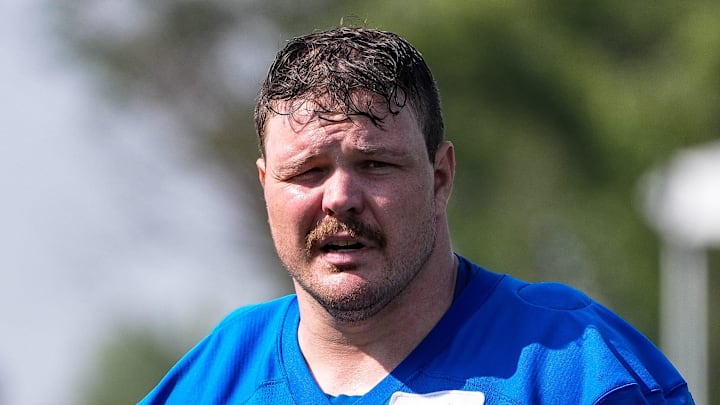 Detroit Lions guard Graham Glasgow (60) walks off the field after practice during training camp at Meijer Performance Center in Allen Park on Monday, July 21, 2025. Detroit Lions guard Graham Glasgow (60) walks off the field after practice during training camp at Meijer Performance Center in Allen Park on Monday, July 21, 2025.