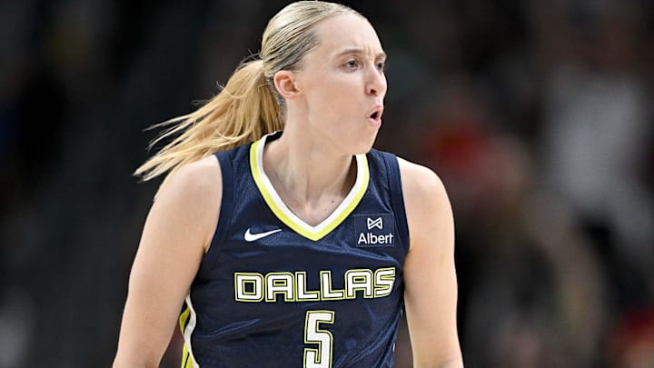Jun 27, 2025; Dallas, Texas, USA; Dallas Wings guard Paige Bueckers (5) in action during the game between the Dallas Wings and the Indiana Fever at the American Airlines Center. Mandatory Credit: Jerome Miron-Imagn Images