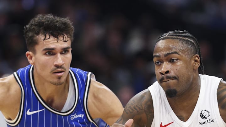 Toronto Raptors guard Jamal Shead moves the ball past Orlando Magic forward Tristan da Silva.