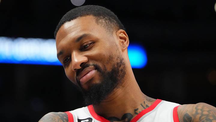 Dec 23, 2022; Denver, Colorado, USA; Portland Trail Blazers guard Damian Lillard (0) reacts towards the Denver Nuggets bench in the second half at Ball Arena. Mandatory Credit: Ron Chenoy-USA TODAY Sports
