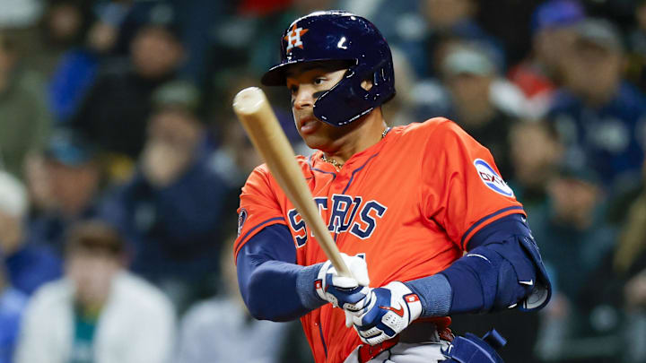 Apr 8, 2025; Seattle, Washington, USA; Houston Astros right fielder Cam Smith (11) hits an RBI-triple against the Seattle Mariners during the seventh inning at T-Mobile Park