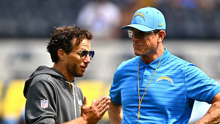Sep 13, 2026; Inglewood, California, USA;  Los Angeles Chargers head coach Jim Harbaugh stands on the field with offensive coordinator Mike McDaniel prior to a game against the Arizona Cardinals at SoFi Stadium.at SoFi Stadium.  Mandatory Credit: William Liang-Imagn Images