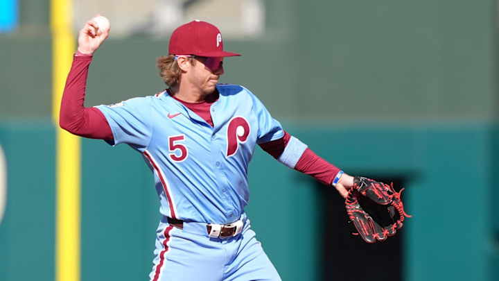 Apr 17, 2025; Philadelphia, Pennsylvania, USA; Philadelphia Phillies infielder Bryson Stott (5) throws to first against the San Francisco Giants in the second inning at Citizens Bank Park.