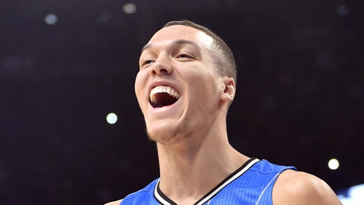 Feb 13, 2016; Toronto, Ontario, Canada; Orlando Magic forward Aaron Gordon reacts after a successful dunk over the Magic mascot during the dunk contest during the NBA All Star Saturday Night at Air Canada Centre. Mandatory Credit: Bob Donnan-Imagn Images