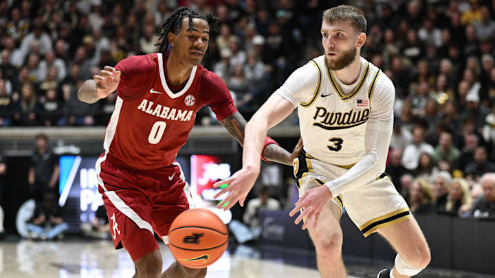 Purdue Boilermakers guard Braden Smith (3) passes the ball around Alabama Crimson Tide guard Labaron Philon (0) 