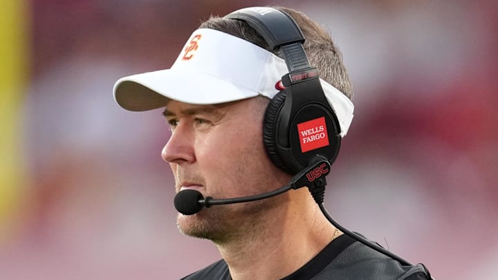 Aug 30, 2025; Los Angeles, California, USA; Southern California Trojans head coach Lincoln Riley watches from the sidelines against the Missouri State Bears in the first half at United Airlines Field at Los Angeles Memorial Coliseum. Mandatory Credit: Kirby Lee-Imagn Images