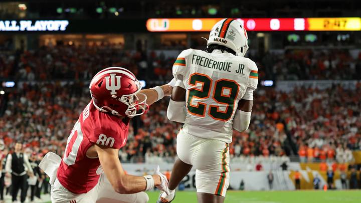 Jan 19, 2026; Miami Gardens, FL, USA; Miami Hurricanes defensive back OJ Frederique Jr. (29) breaks up a touchdown pass intended for Indiana Hoosiers wide receiver Charlie Becker (80) in the first quarter during the College Football Playoff National Championship game at Hard Rock Stadium. Mandatory Credit: Sam Navarro-Imagn Images Jan 19, 2026; Miami Gardens, FL, USA; Miami Hurricanes defensive back OJ Frederique Jr. (29) breaks up a touchdown pass intended for Indiana Hoosiers wide receiver Charlie Becker (80) in the first quarter during the College Football Playoff National Championship game at Hard Rock Stadium. Mandatory Credit: Sam Navarro-Imagn Images