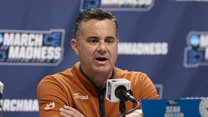 Texas Longhorns head coach Sean Miller answers questions during a press conference before a practice session ahead of the first round of the men's 2026 NCAA Tournament at Moda Center. Texas Longhorns head coach Sean Miller answers questions during a press conference before a practice session ahead of the first round of the men's 2026 NCAA Tournament at Moda Center.