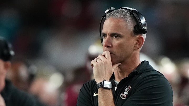 Dec 30, 2023; Miami Gardens, FL, USA; Florida State Seminoles head coach Mike Norvell reacts against the Georgia Bulldogs during the second half in the 2023 Orange Bowl at Hard Rock Stadium. Mandatory Credit: Jasen Vinlove-Imagn Images