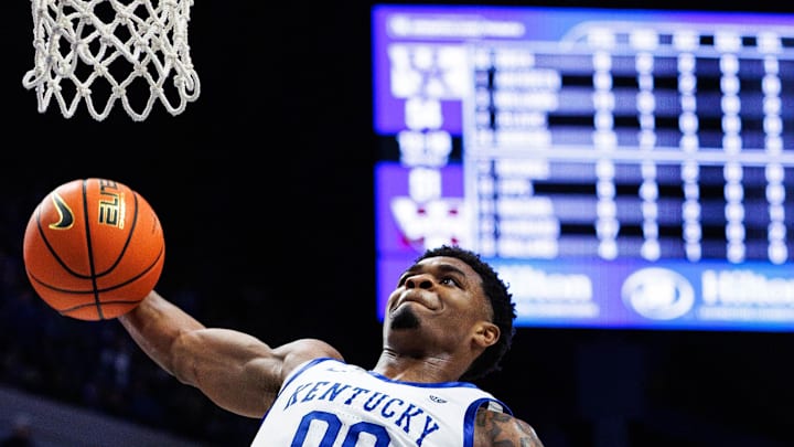 Jan 10, 2026; Lexington, Kentucky, USA; Kentucky Wildcats guard Otega Oweh (00) dunks the ball during the second half against the Mississippi State Bulldogs at Rupp Arena at Central Bank Center. Mandatory Credit: Jordan Prather-Imagn Images