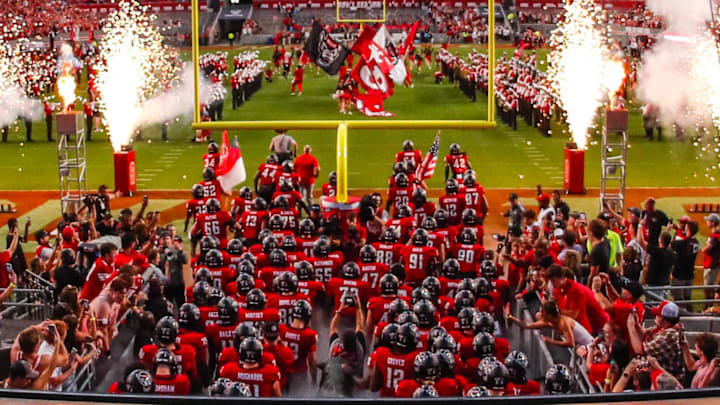 Sep 27, 2025; Raleigh, North Carolina, USA; The North Carolina State Wolfpack takes to the field before the first half of the game against Virginia Tech Hokies at Carter-Finley Stadium. Mandatory Credit: Jaylynn Nash-Imagn Images Sep 27, 2025; Raleigh, North Carolina, USA; The North Carolina State Wolfpack takes to the field before the first half of the game against Virginia Tech Hokies at Carter-Finley Stadium. Mandatory Credit: Jaylynn Nash-Imagn Images