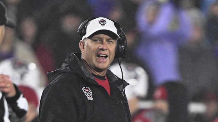 Dec 28, 2024; Annapolis, MD, USA;  North Carolina State Wolfpack head coach Dave Doeren reacts after a play during the first half of the Go Bowling Military Bowl at Navy-Marine Corps Memorial Stadium. Mandatory Credit: Tommy Gilligan-Imagn Images