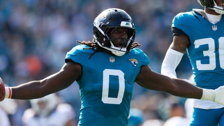 Jacksonville Jaguars linebacker Devin Lloyd (0) celebrates a fumble recovery with cornerback Montaric Brown (30) during the second quarter of an NFL football AFC Wild Card playoff matchup, Sunday. Jacksonville Jaguars linebacker Devin Lloyd (0) celebrates a fumble recovery with cornerback Montaric Brown (30) during the second quarter of an NFL football AFC Wild Card playoff matchup, Sunday.